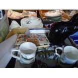 Box of military themed items including mugs, plates, flags, matchboxes, picture, etc