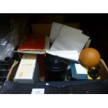 Two boxes of vintage camera accessories, including slides, reels, etc
