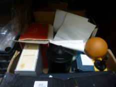 Two boxes of vintage camera accessories, including slides, reels, etc