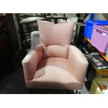 Pink bedroom chair on castors