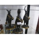 Three metal animal band ornaments, including Stag, Duck and Pig