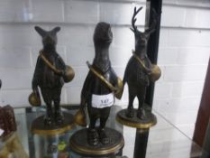 Three metal animal band ornaments, including Stag, Duck and Pig