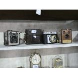 3 vintage cameras 2 by Kodac, '6/51x20 model D', Brownie flash IV' and a case.