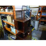 Small proportioned mahogany coloured revolving bookcase, including four drawer chest of small