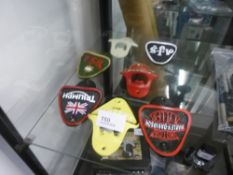 Seven motorbike bottle openers