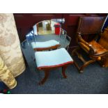 A reproduction art deco style wall mirror and a dressing stool