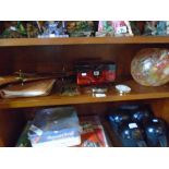 A shelf of mixed collectables including lacquer box, compacts, etc