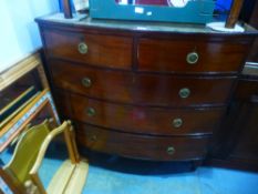 Bow fronted chest of 2 short over 3 large drawers and brass round handles