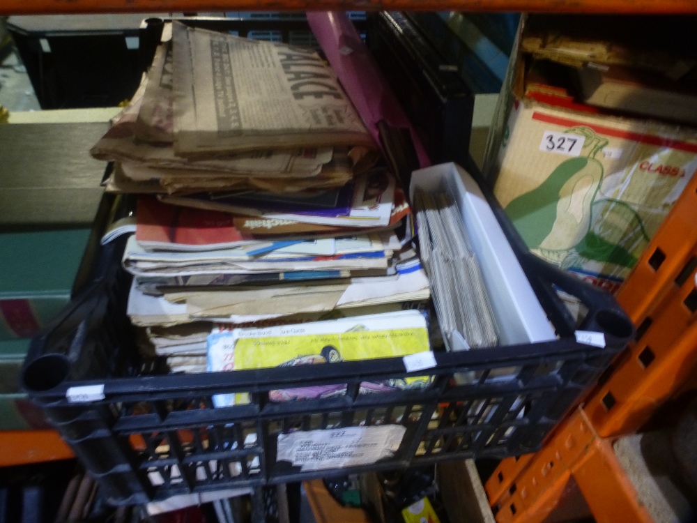 Box of mixed ephemera to include magazines, post cards, and a box of vintage books