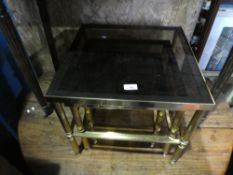 Nest of 3 brass and black glass coffee tables