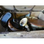 A wooden chest with a brass bowl on legs, Spanish style dishes, metalware and binoculars