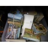 A box of modern postcards