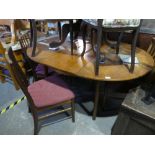 Teak circular extending table and set of 4 dining chairs