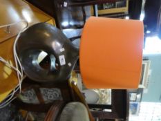 decorative table lamp with orange shade