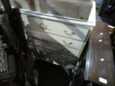 White pained gesso style drawers with 5 drawers and glass top