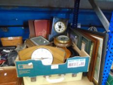 A mixed box of collectables including stamp albums clocks and a cased picnic set with contents and