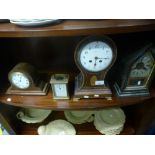 Three mantle clocks and a carriage clock