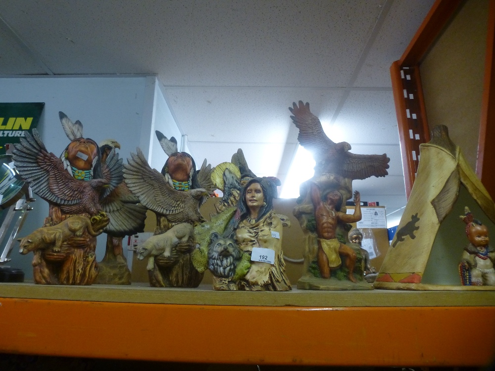 A Selection of china Indian figures and T-Pe with a child in it.