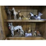 Collection of china Great Dane statues and a print of child and child