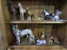 Collection of china Great Dane statues and a print of child and child