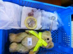 A plush teddy, a bays rattle and sundry items