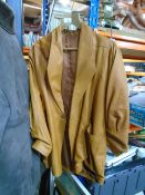 Ladies vintage brown leather jacket.