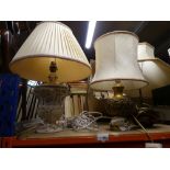 Three lamps with shades,