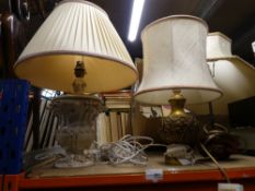 Three lamps with shades,