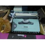 Vintage Olivetti typewriter, camera lenses, etc