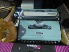 Vintage Olivetti typewriter, camera lenses, etc