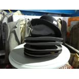 Quantity of as new men’s trilby hats and a 1920s Bowler example