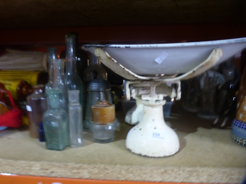 Harrods scales with weights, with collection of medicine bottles