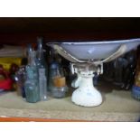 Harrods scales with weights, with collection of medicine bottles