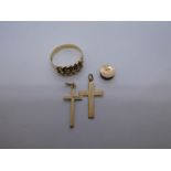 Two 9ct yellow gold cross pendants unmarked yellow metal knot ring gold stud, etc, weight approx 6.1