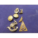 Triangular bar brooch bearing Royal Navy insignia, two military buttons, etc
