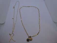 14K yellow gold twist design neck chain, hung with 2 14K eye pendants marked 14K, 5.6g and and unmar