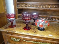 A pair of table lamps having gilt and mirror decoration, a large brass lamp, a set of four Bohemian