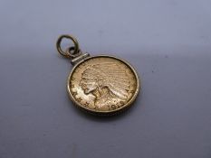 1915 2 1/2 Dollar in yellow gold mount, total lot weight 5.1g