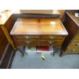 An antique lowboy having four drawers on cabriole legs, top not original, 83 cms