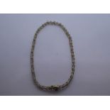 9ct two tone clear stone set bracelet, marked 375