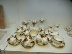 A large quantity of Royal Albert 'Old Country Roses' dinner and teaware, to include four vegetable d