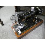 Two vintage Singer sewing machines - one converted