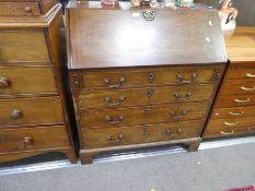 A Georgian mahogany bureau having four long graduated drawers on bracket feet, 94 cms