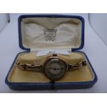 Vintage 9ct yellow gold ladies 15 Jewell wristwatch in 375 marked case, on 9ct yellow gold adjustabl