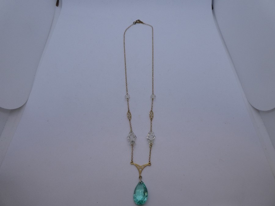Pretty 9ct yellow gold necklace hung with clear stones and tear shaped, marked 9ct