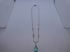 Pretty 9ct yellow gold necklace hung with clear stones and tear shaped, marked 9ct