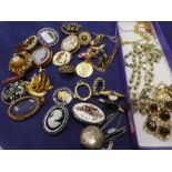 Tray of costume jewellery to include, silver circular locket, silver gilt millefiori brooch, white a