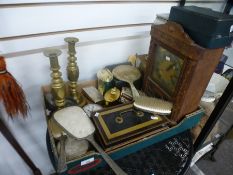 A pair of brass candlesticks, various clocks and sundry