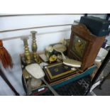 A pair of brass candlesticks, various clocks and sundry