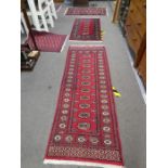Six small modern Bukhara rugs, having elephant pad design